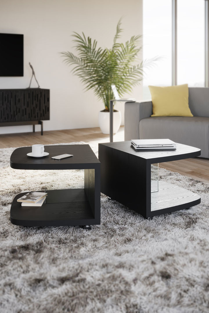 Muv motion tables by BDI Furniture in Ebonized Ash finish. Muv can join together to create a generously sized coffee table, or pulled apart to create two moveable end tables.